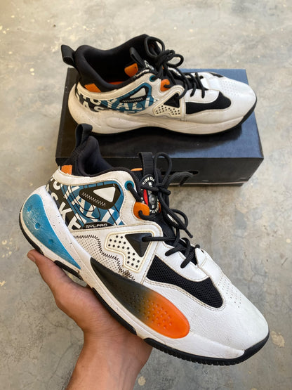 Multi-color high-top athletic sneakers graphic print orange blue panels black laces