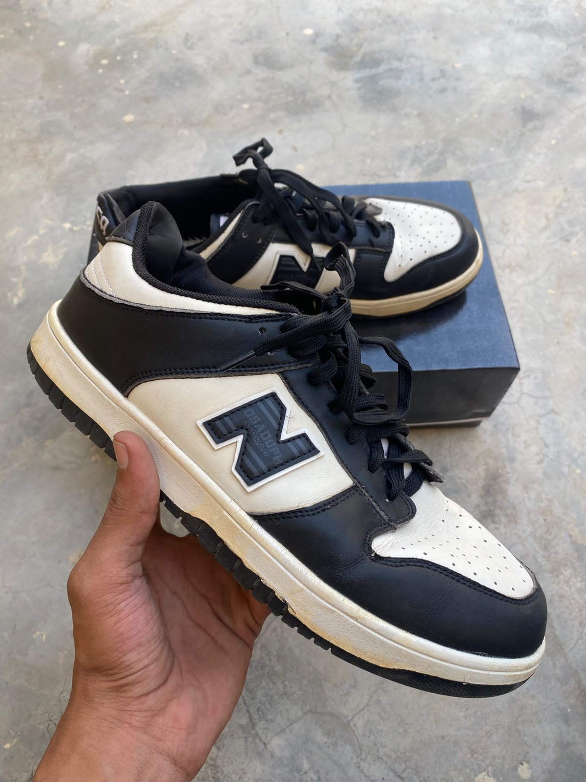 New Balance 480 sneakers in a black and white colorway