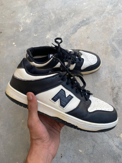 New Balance 480 sneakers in a black and white colorway